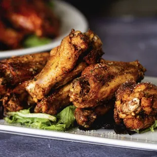 a plate of chicken wings