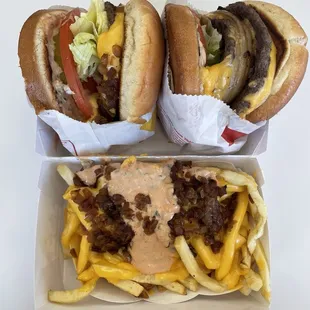 Cheeseburger animal style (left), double-double with whole grilled onions  (right), animal fries (bottom)