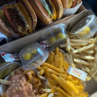 Dad&apos;s double- double   Twins cheeseburgers!  Cheese fries    ( Strawberry shake not pictured)