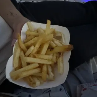 ows a plate of french fries