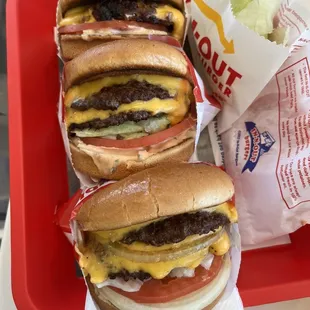 Single with grilled onions, double double with grilled, and double double with whole grilled and raw