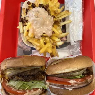 Animal style Double double and hamburger with grilled whole onions and extra toasted bun, animal fries light well