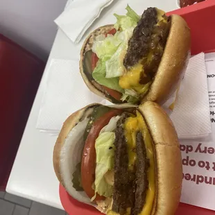 Double double animal style with raw onions, cheeseburger animal style with xtra lettuce