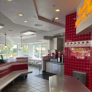 ows a red and white kitchen