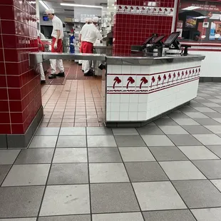 Employees preparing food. Although some preferred to talk instead