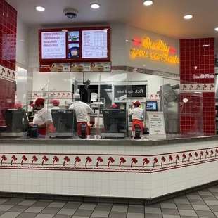 ows a restaurant with red and white tile