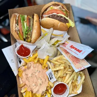 ows a box of fries and a burger