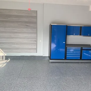 a blue cabinet with drawers