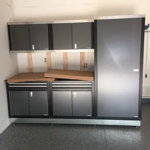 a work bench and cabinets