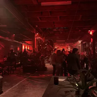 a restaurant with red lighting