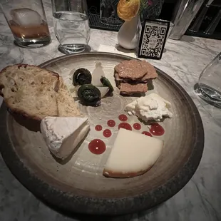 a plate of cheese and crackers