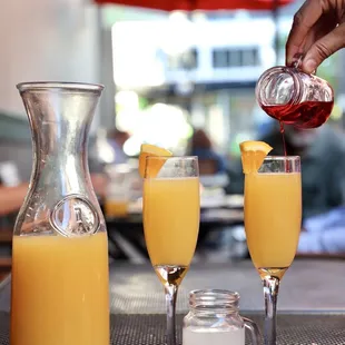 Mimosa pitcher + grenadine