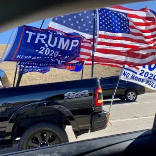 a truck with flags on it