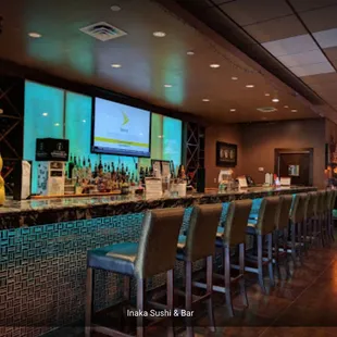 a bar with a large screen
