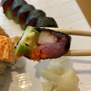 a close up of a plate of sushi