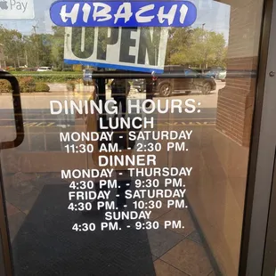 a sign in the window of a restaurant