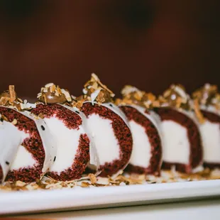 a red velvet roll on a plate