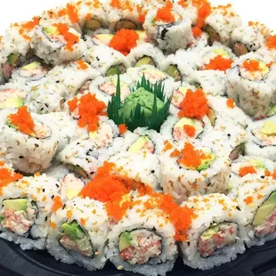 a plate of sushi on a white background