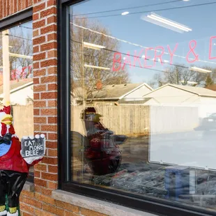 a chicken in a window