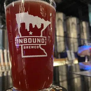 a pint glass of beer