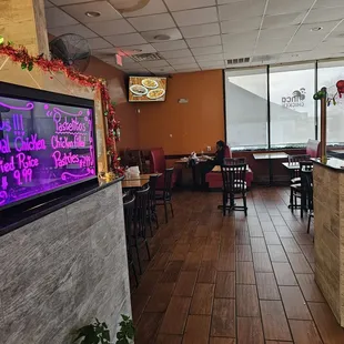 a neon sign in a restaurant