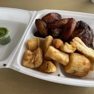 a meal in a styrofoam container
