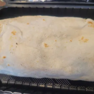 a burrito as big as my forearm