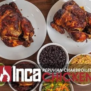 two plates of chicken, rice, and beans