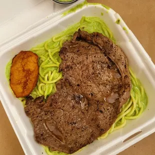 a meal in a styrofoam container