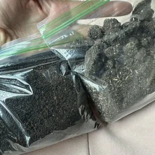 Bag on the right is inch by inch &quot;worm castings&quot; and bag on the left is one of their competitors worm castings.