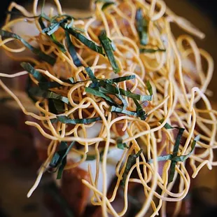 Dduk: rice cakes, green curry, bamboo shoots, eomuk