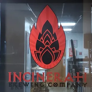 a sign for incinerate brewing company