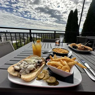 Incline Cheesesteak, fries, and grippos-crusted mac &amp; cheese.  LOTS of leftovers to take home!