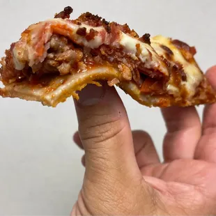 Incorvia&apos;s Meat Lovers Pizza has so much meat that it &quot;falls off the bone!&quot;