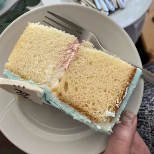Overdone dry cake with disgusting strawberry icing.