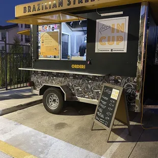 Outside of the food truck.