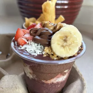 Açaí Cup - peanut butter, Nutella, homemade granola, coconut flakes, strawberries, bananas