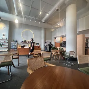 a large open space with tables and chairs