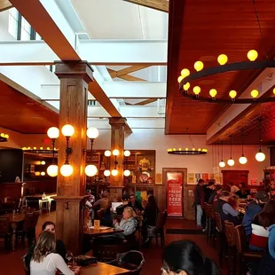 a large group of people sitting at tables