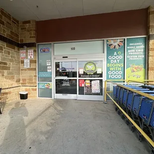 the entrance to a grocery store