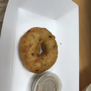 a donut and a cup of coffee