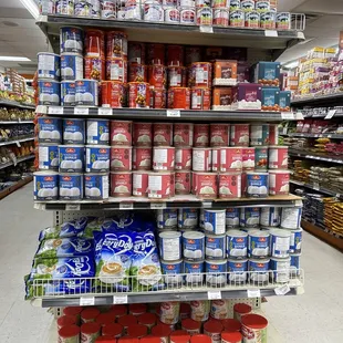 shelves of canned food in a grocery store
