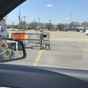 a shopping cart in a parking lot