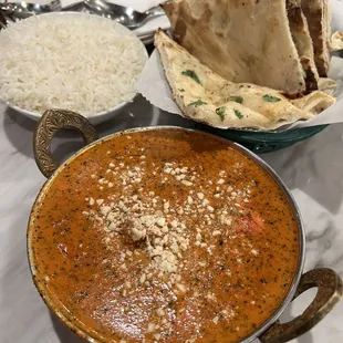 Chicken Makhani, rice, and garlic naan
