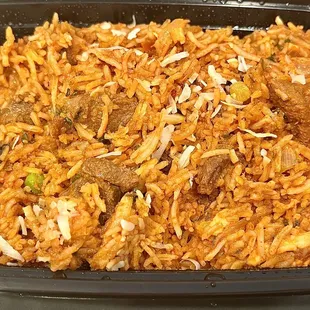 Lamb biryani with almonds, golden raisins, and spices