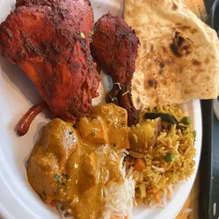 My plate (Tandoori, Butter Chicken, Veggie Biryani, Garlic Naan)