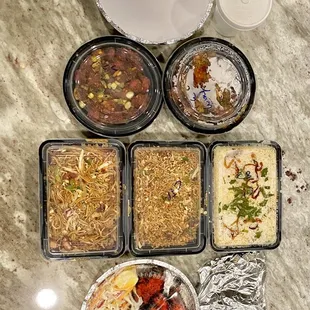 a variety of food in plastic containers