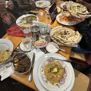 MASALA TEA MASALA FRENCH FRIES LAMB BIRYANI BREAD BASKET (Assortment of naan) PANEER TIKKA MASALA GOAT PEPPER FRY