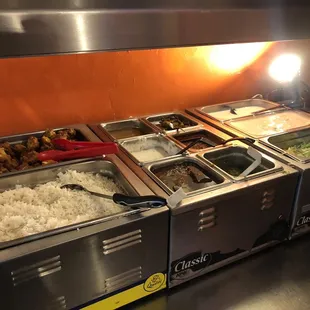 a variety of food items in a buffet