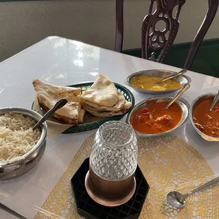 Rice, Naan, two chicken tikki masala and veggie dish